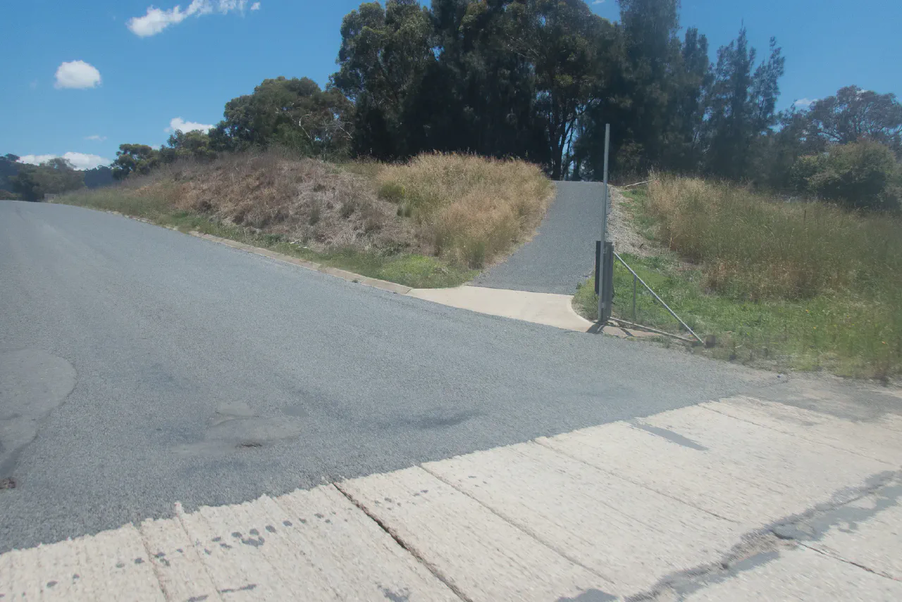 A very stupid, dangerous and scary mergin of bike path and country highway