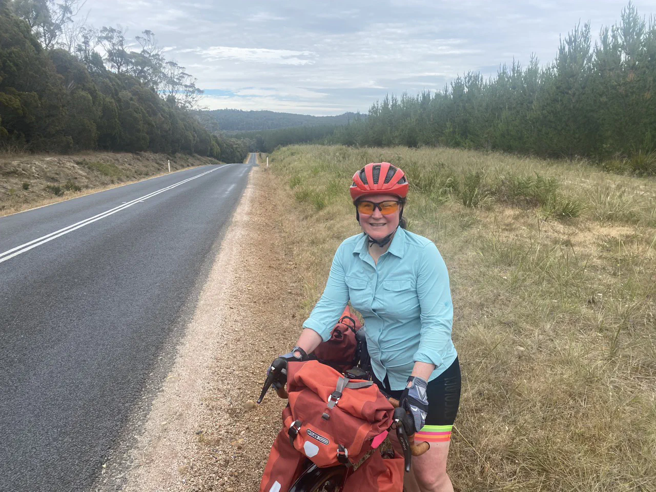 Danielle taking a rest at the side of the road