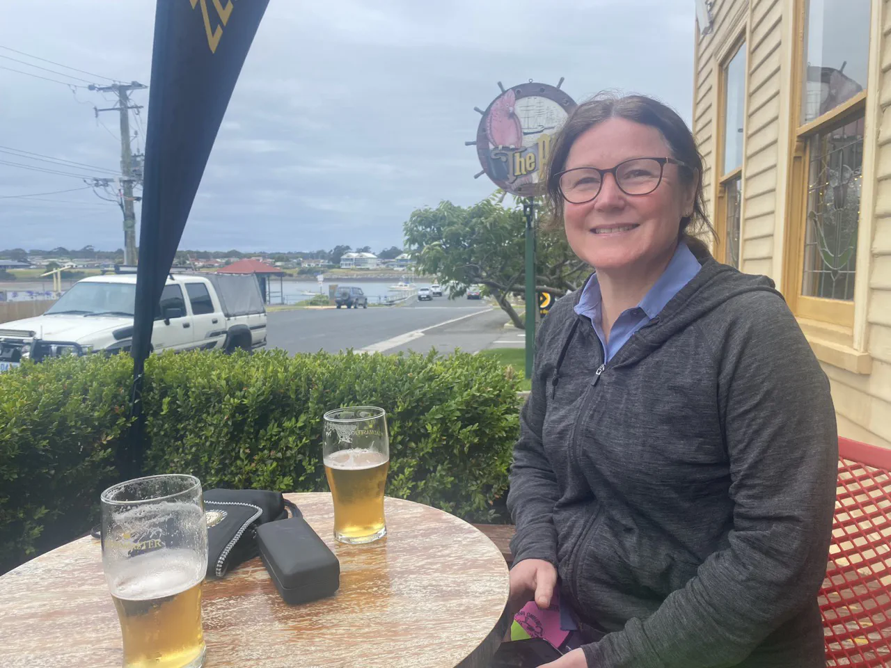 Danielle having a pint at The Pier. She earned it.